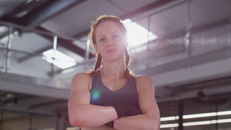 Portrait-Of-Smiling-Mature-Woman-Wearing-Fitness-Clothing-Standing-In-Gym-Ready-To-Exercise-2